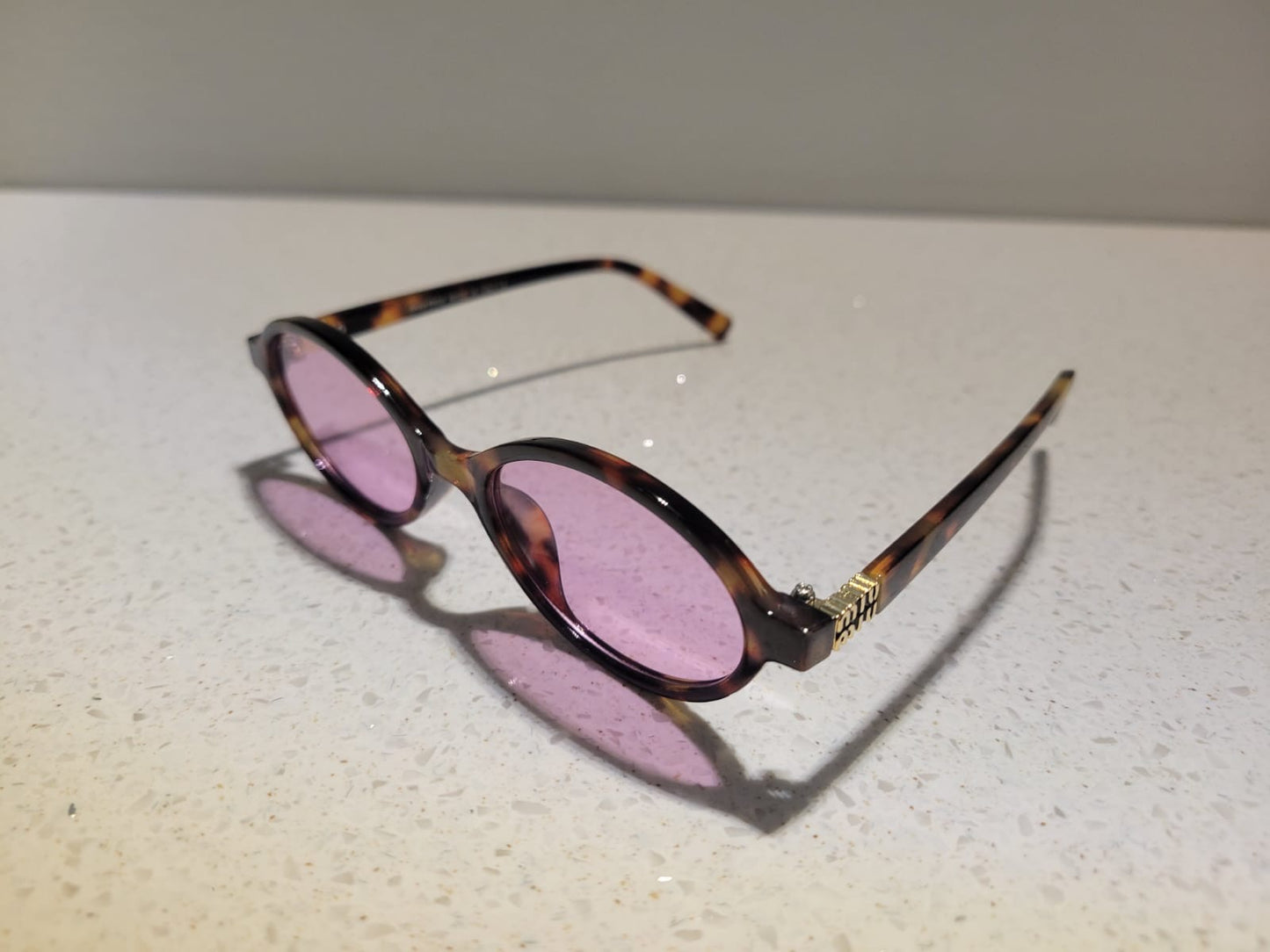 Miu Miu oval sunglasses Brown