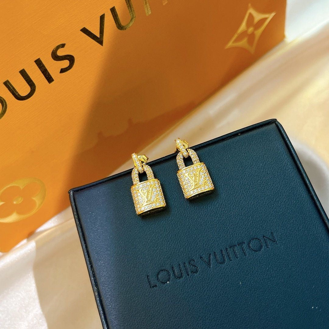 LV Gold lock earrings