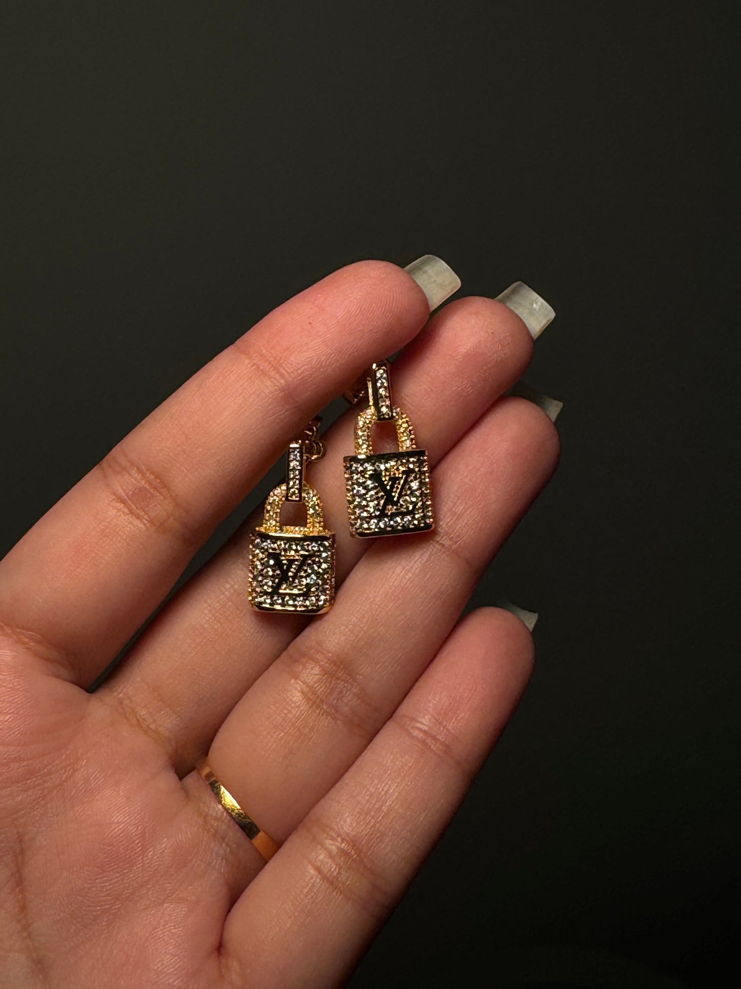 LV Gold lock earrings