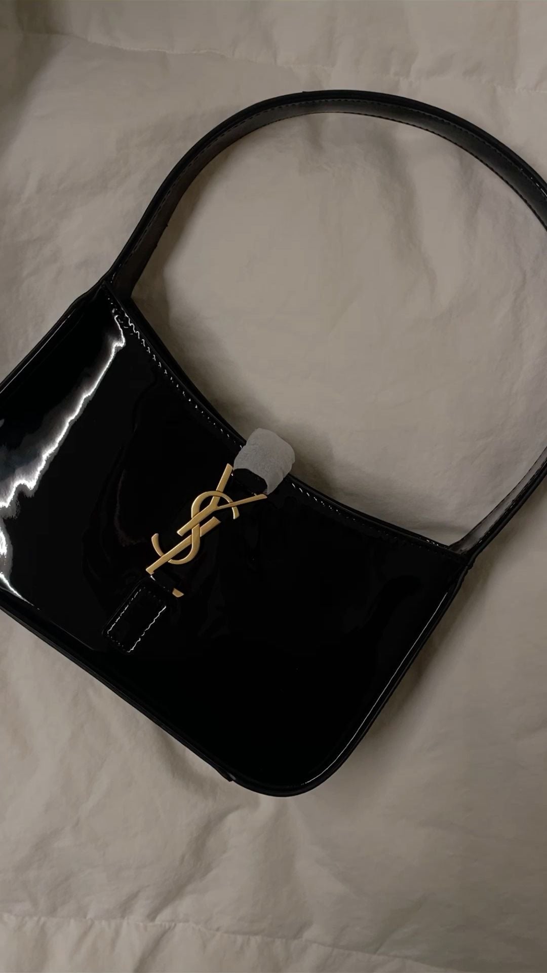 SAINT LAURENT
Mini Le 5 à 7 Hobo Shoulder Bag in gloss leather