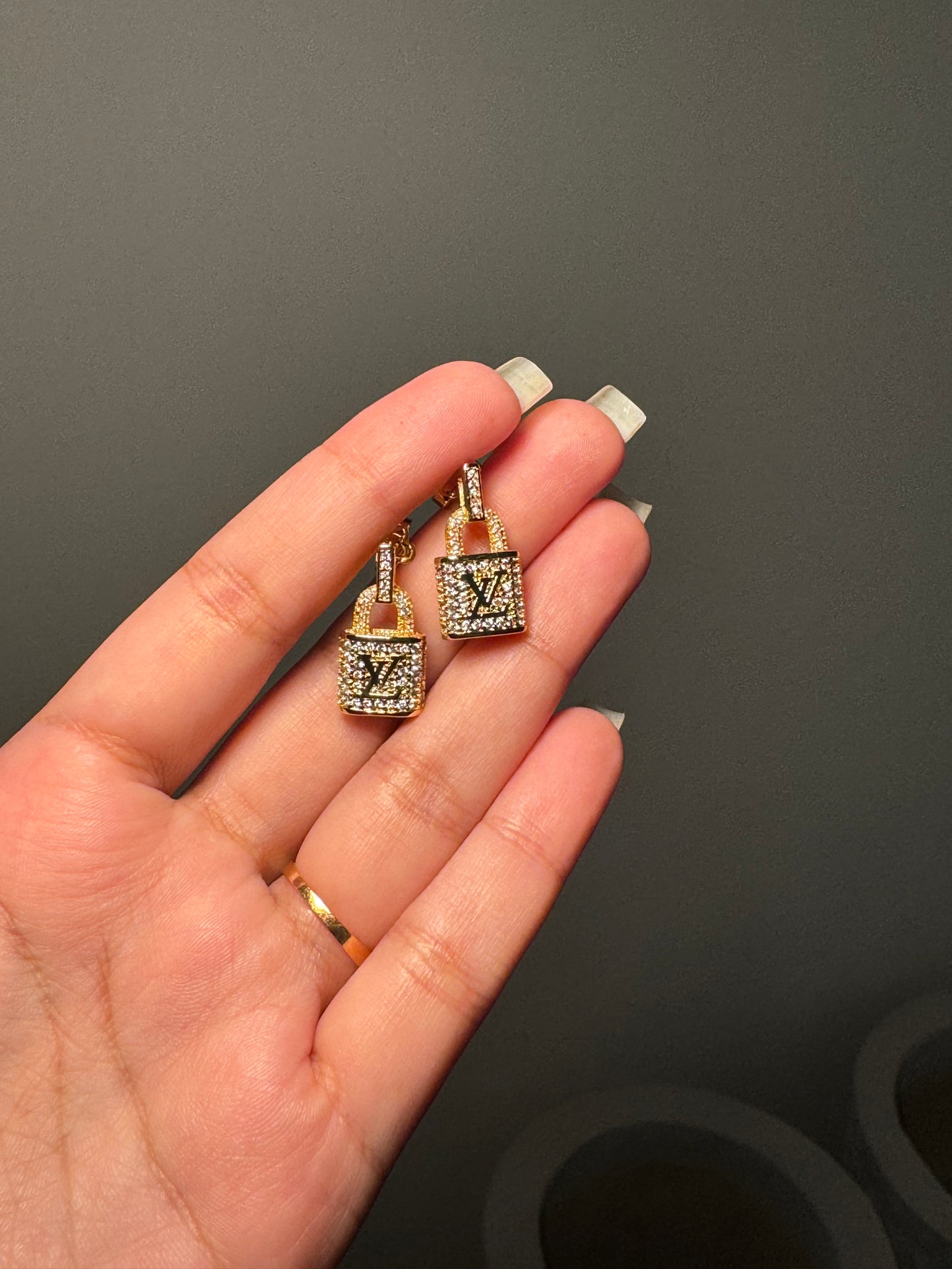 LV Gold lock earrings