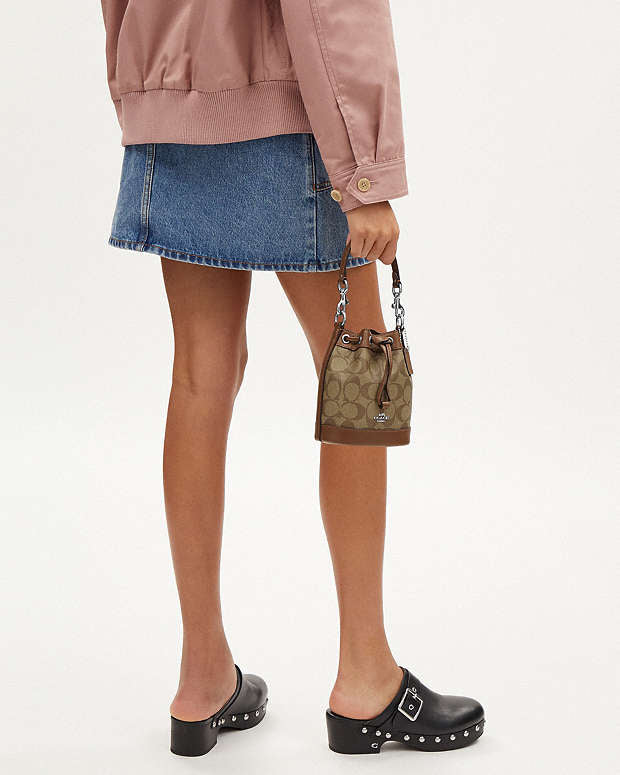Mini Bucket Bag In Signature Canvas