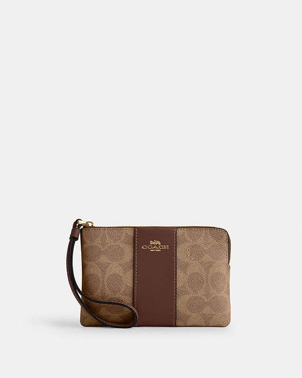 Coach Corner Zip Wristlet In Signature Canvas With Stripe
