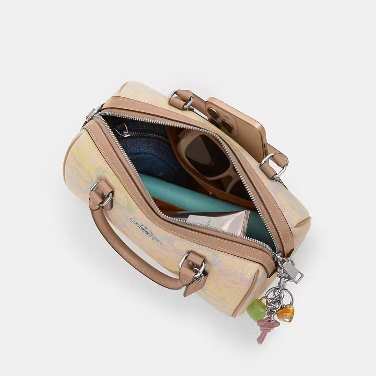 Coach Rowan Satchel Bag
In Rainbow Signature Canvas