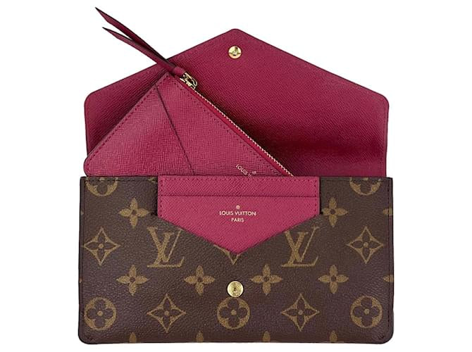 LOUIS VUITTON
Monogram Canvas Fuchsia Jeanne Wallet