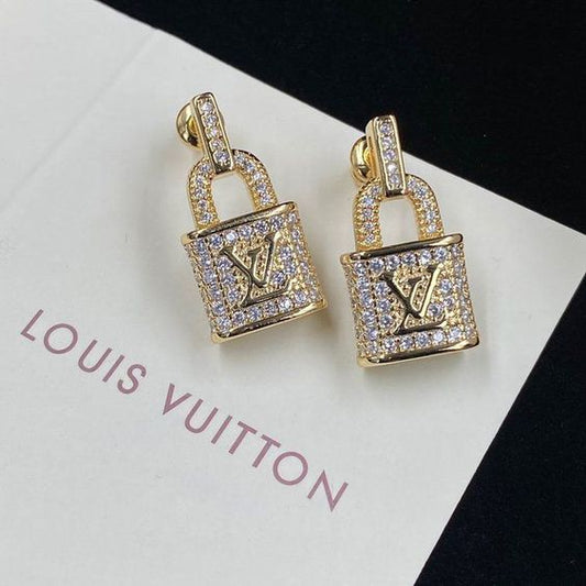 LV Gold lock earrings