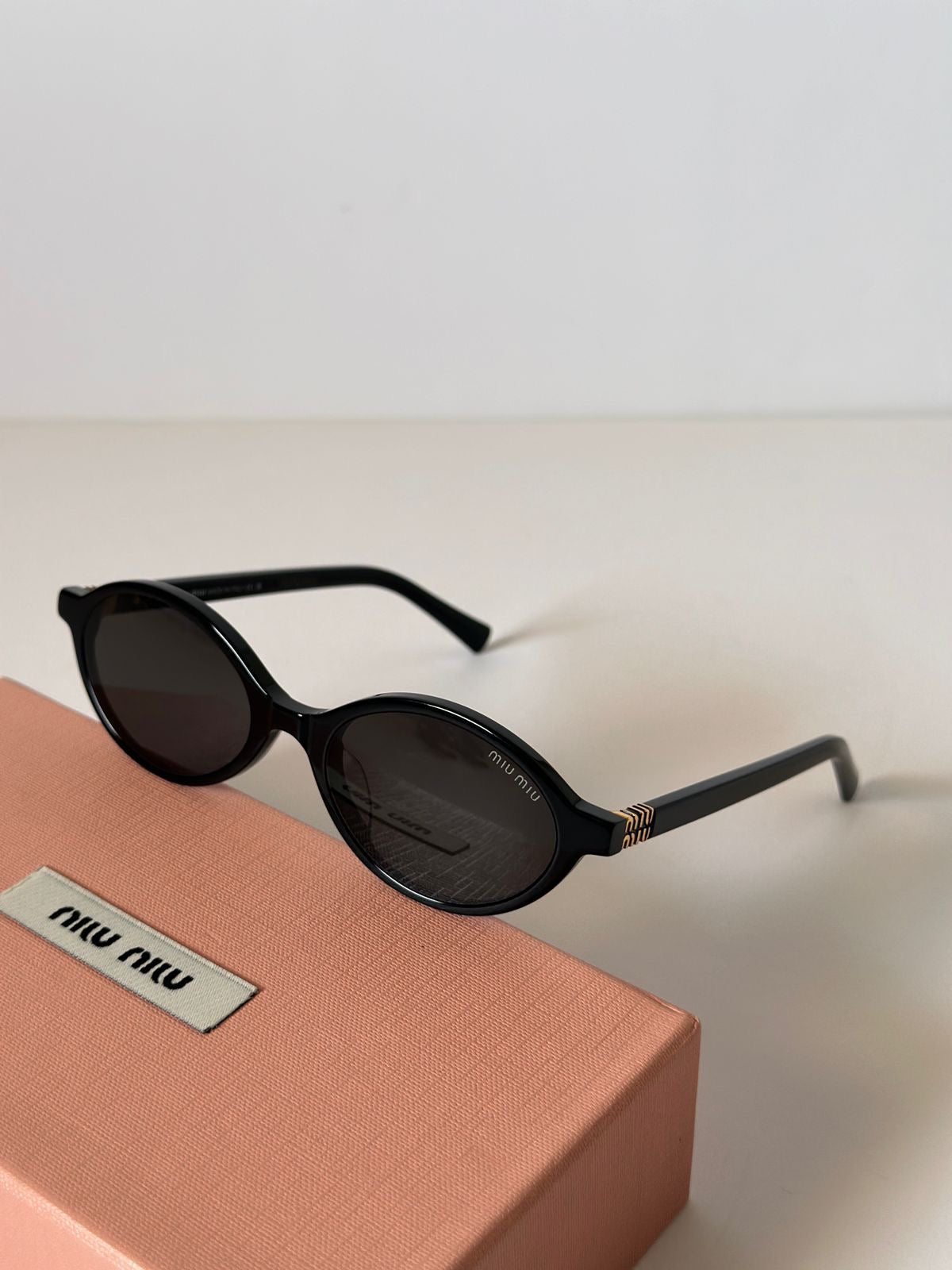 Miu Miu thin frame Black