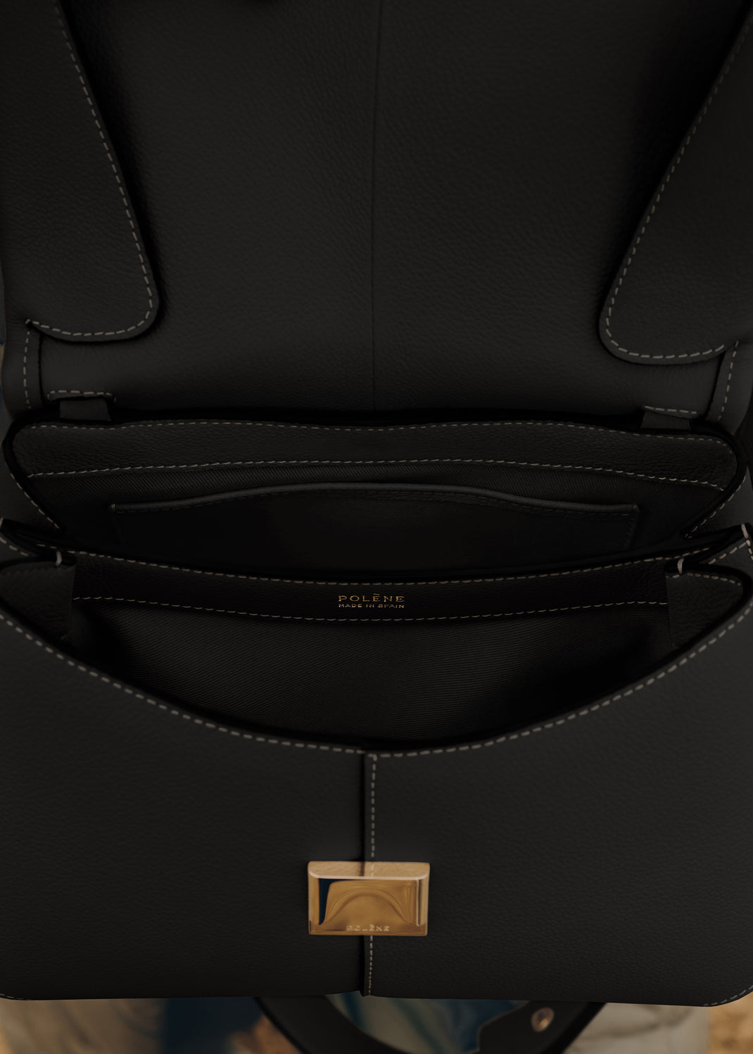 Mokki
EDITION TEXTURED BLACK WITH ECRU STITCHING