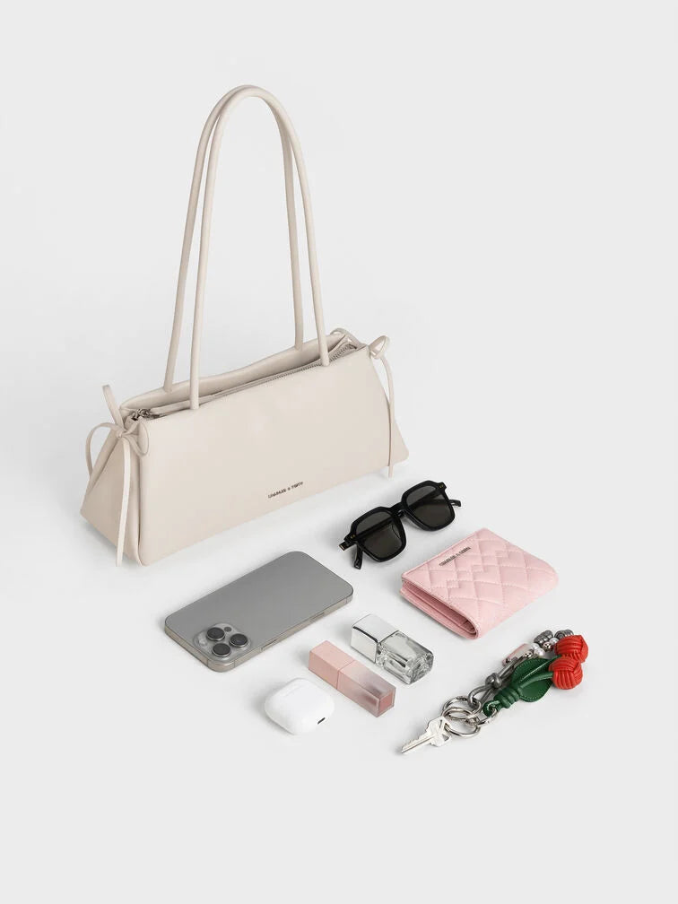 Charles & Keith - Hazel Bow Elongated Trapeze Shoulder Bag- White