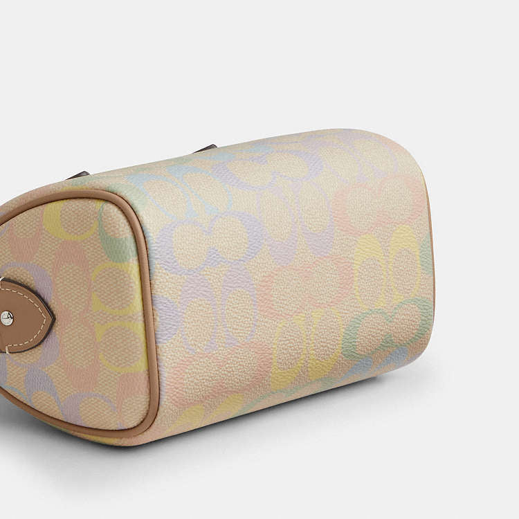 Coach mini Rowan Bag
In Rainbow Signature Canvas