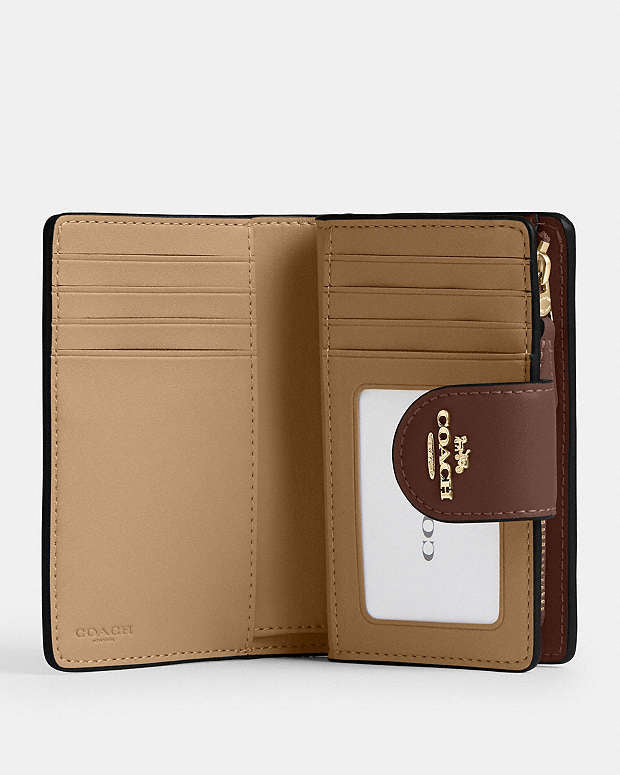 Medium Corner Zip Wallet In Signature Canvas