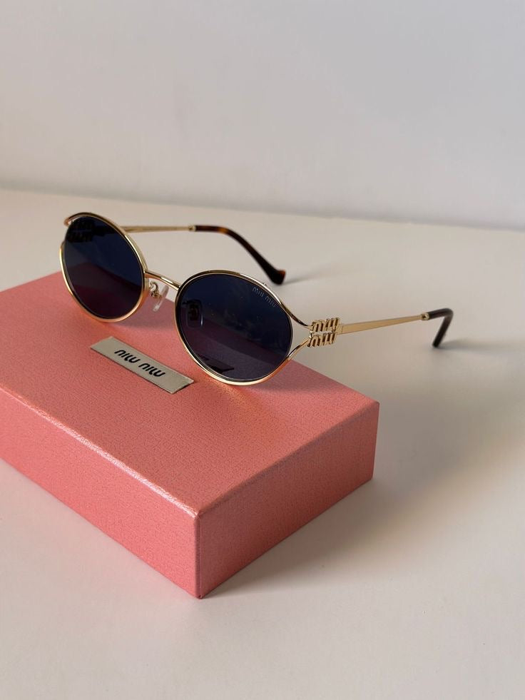 Metal frame miu miu blue lenses