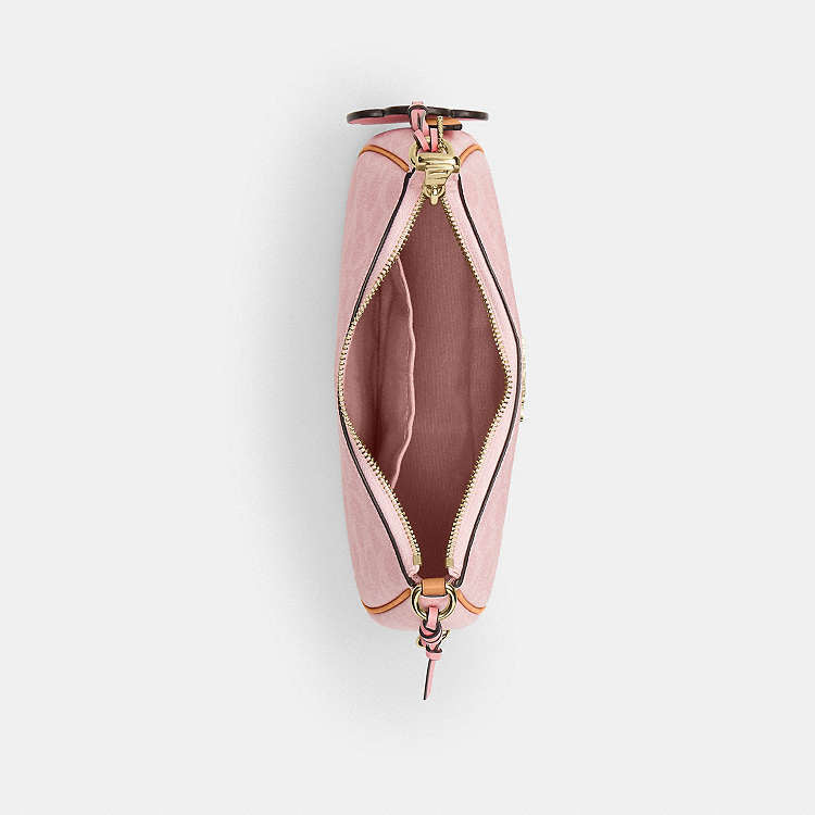 Teri Shoulder Bag
In Signature Canvas With Charm