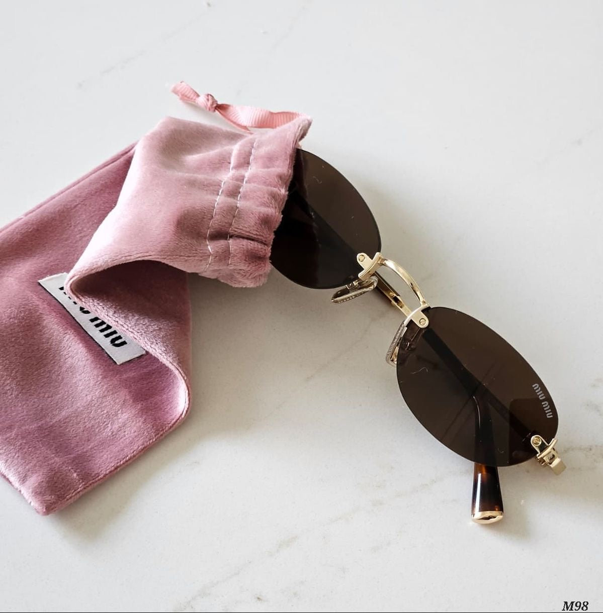Miu miu rimless brown