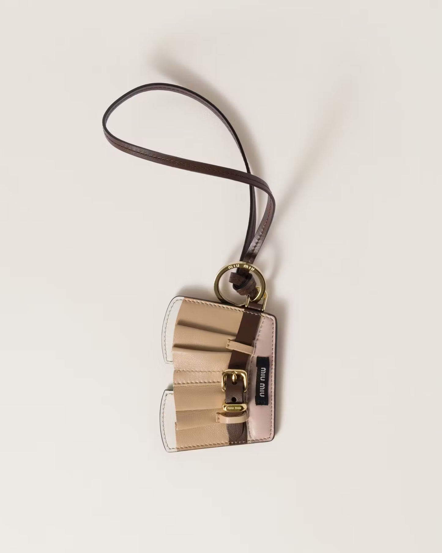 MIU MIU

Skirt leather keychain trick