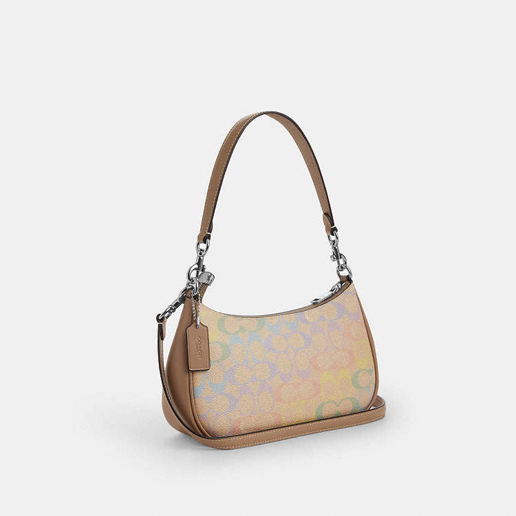 Coach Teri Shoulder Bag
In Rainbow Signature Canvas