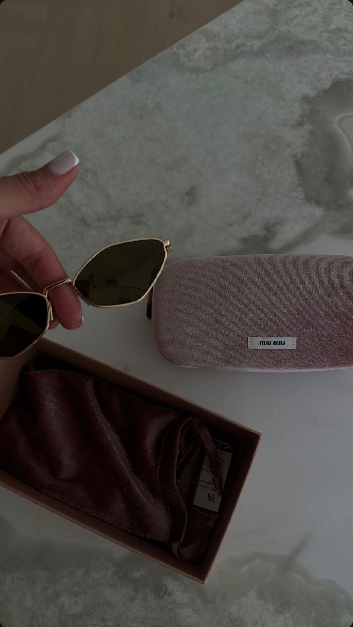 Miu Miu sunnies black