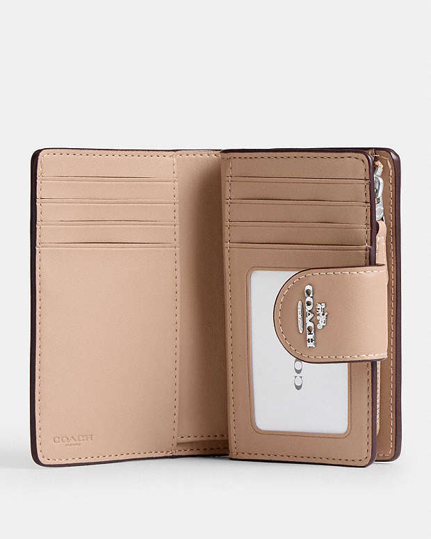 Medium Corner Zip Wallet In Signature Canvas
