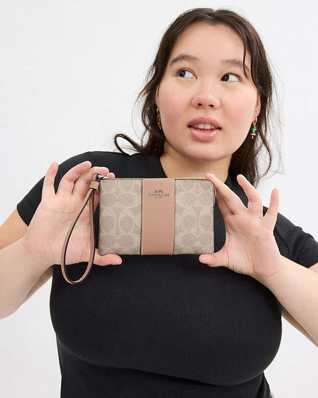 Coach Corner Zip Wristlet In Signature Canvas With Stripe