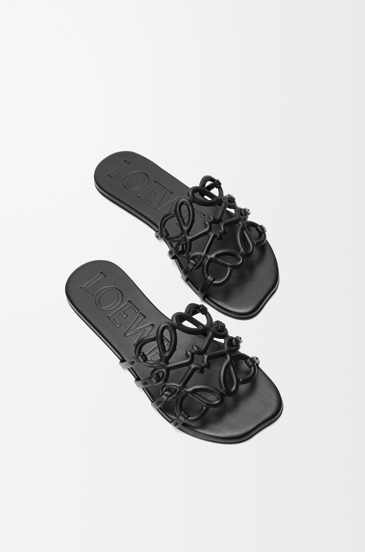 LOEWE
Black Leather Petal Anagram Slides