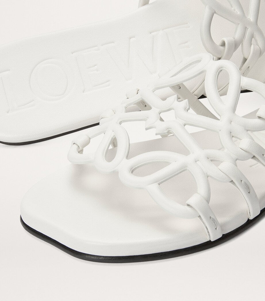 LOEWE
White Leather Petal Anagram Slides
