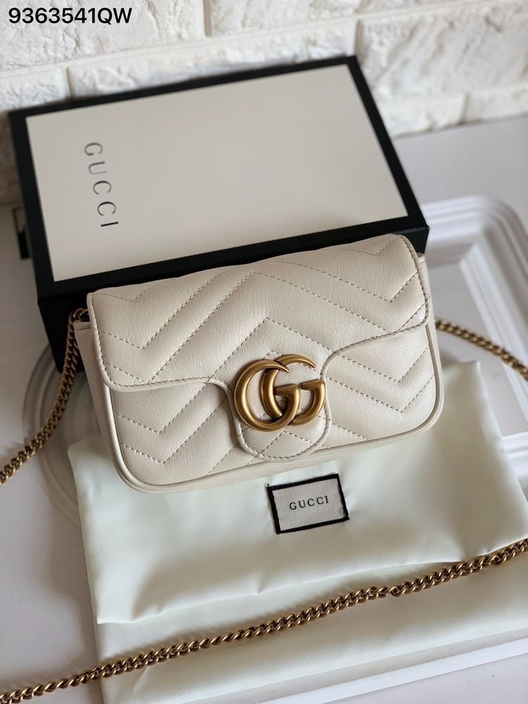 GG Marmont Super Mini shoulder bag in white - Gucci |