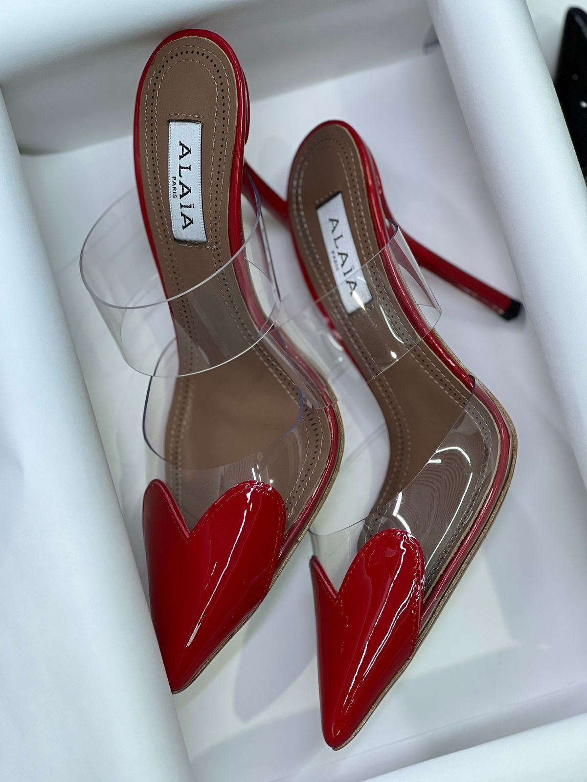 ALAiA  LE CŒUR MULES IN PATENT LEATHER ❤️