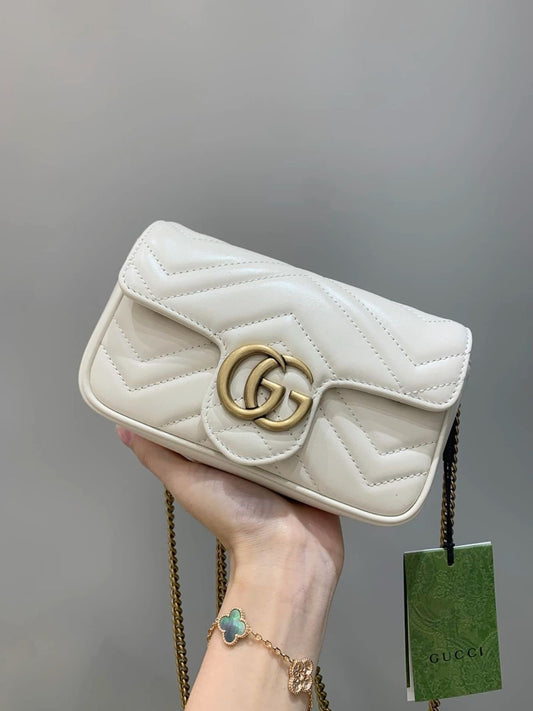 GG Marmont Super Mini shoulder bag in white - Gucci |