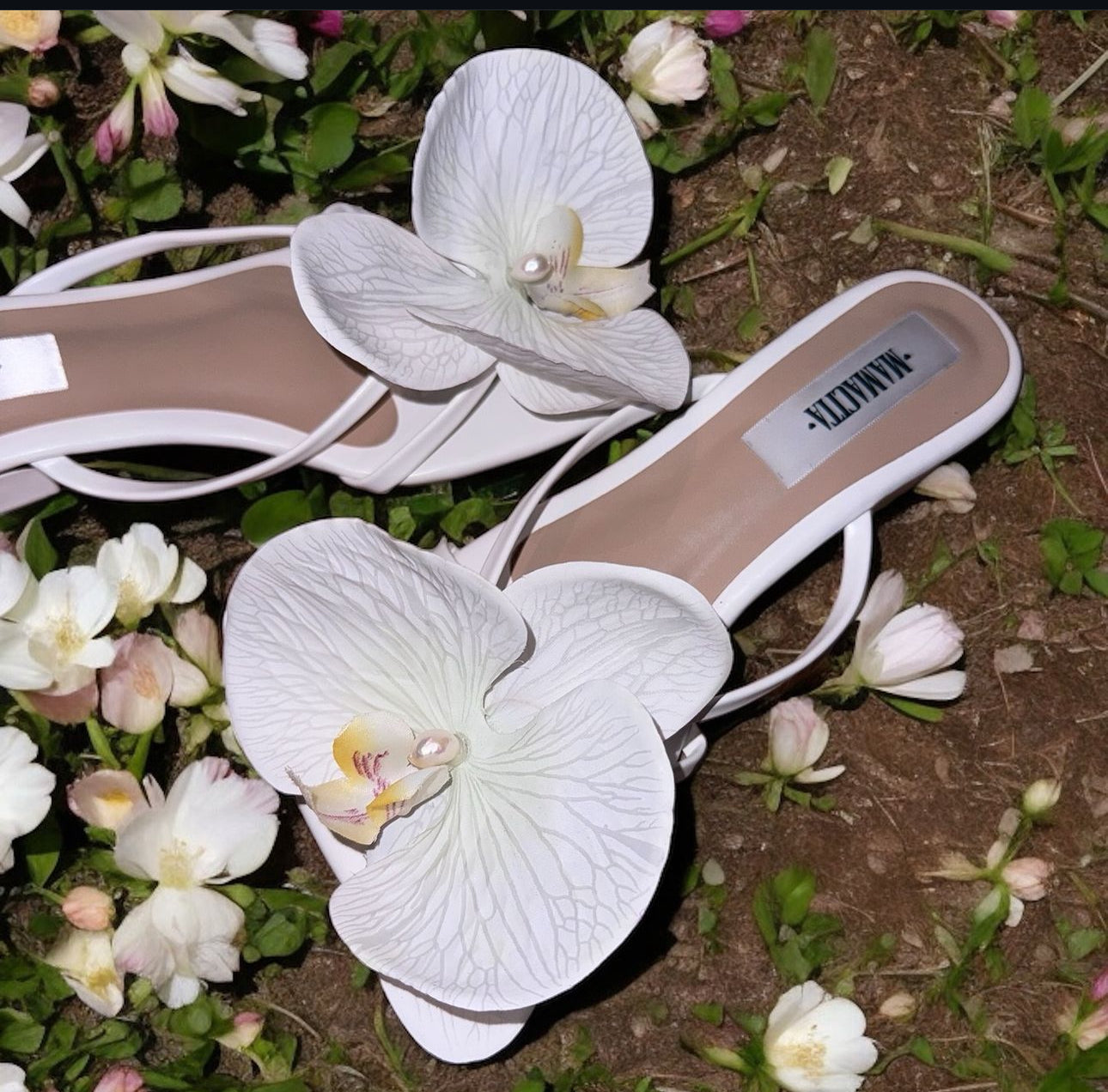 White orchid shoe attachment