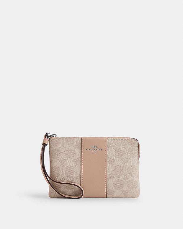 Coach Corner Zip Wristlet In Signature Canvas With Stripe