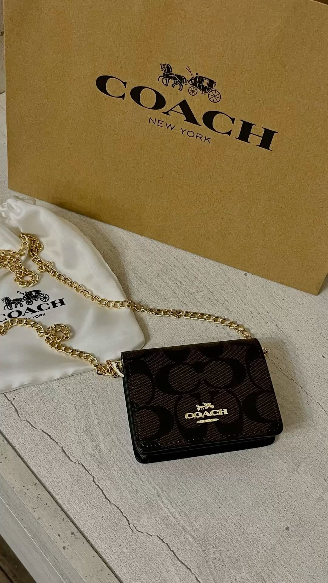 Coach Wallet on chain in signature canvas