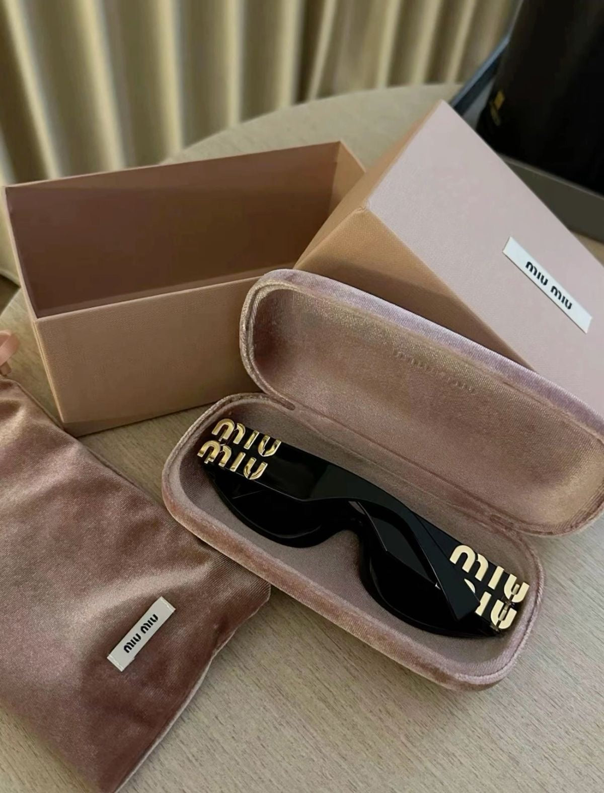 Miu Miu oval frame sunnies