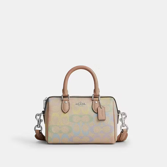 Coach mini Rowan Bag
In Rainbow Signature Canvas