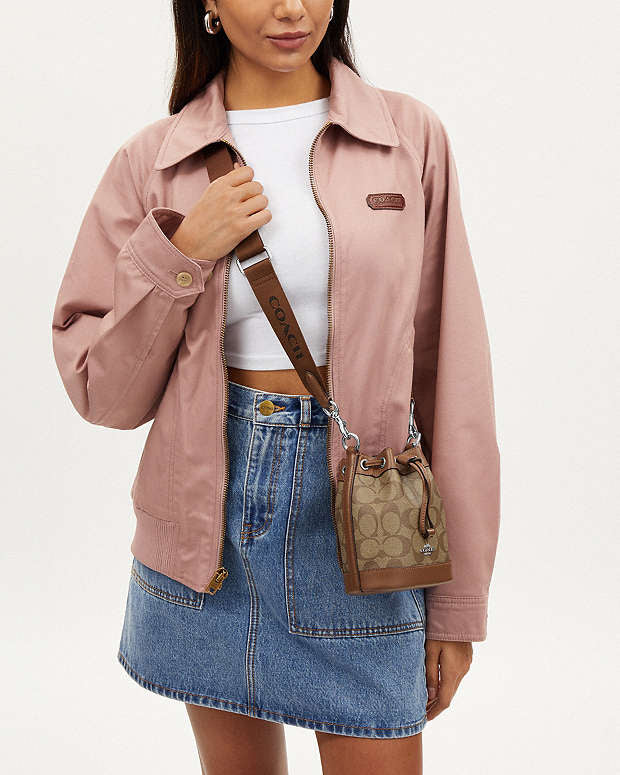 Mini Bucket Bag In Signature Canvas