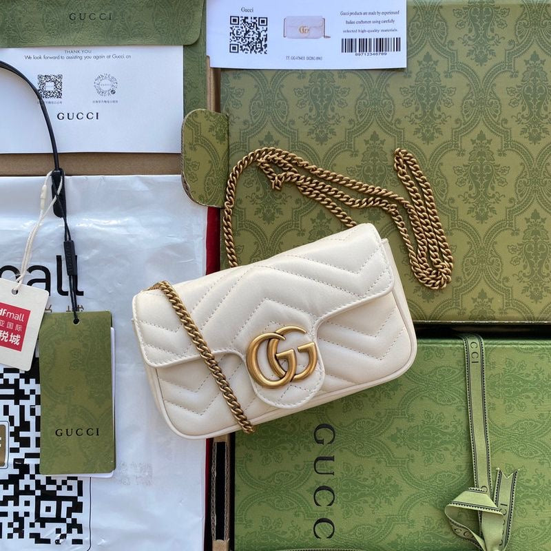 GG Marmont Super Mini shoulder bag in white - Gucci |