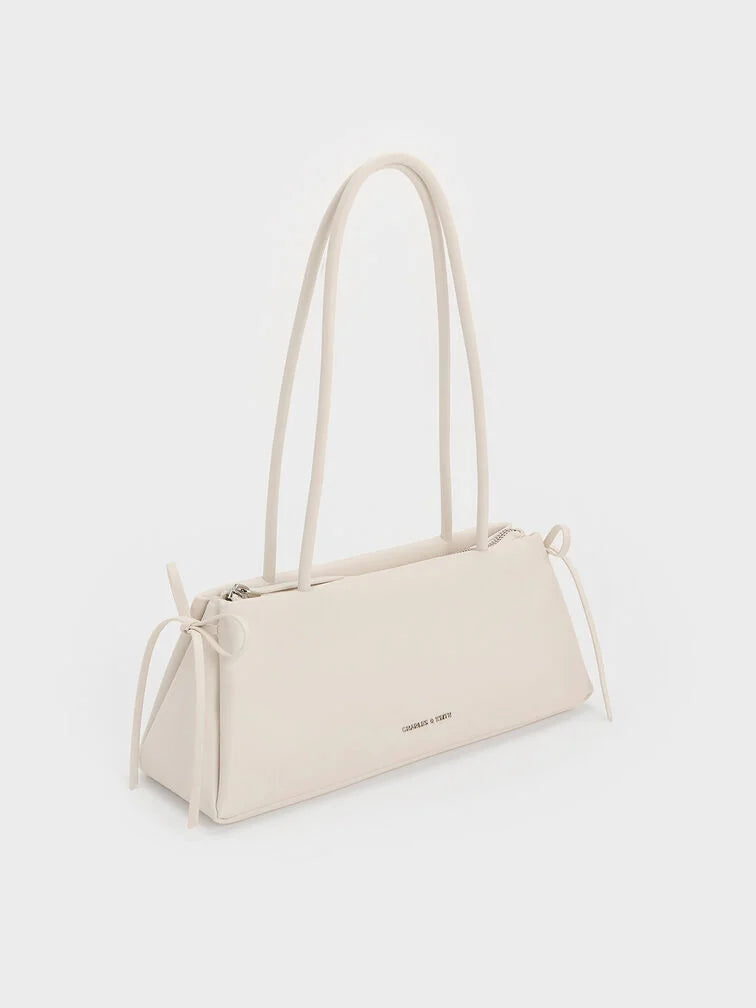 Charles & Keith - Hazel Bow Elongated Trapeze Shoulder Bag- White