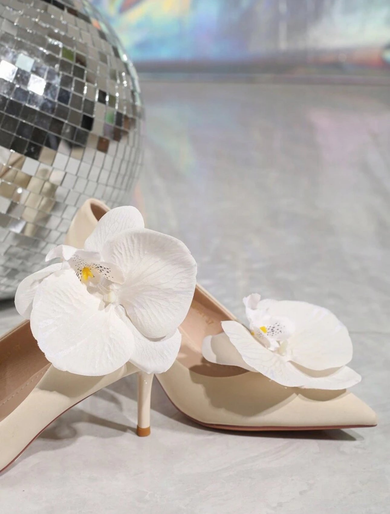 White orchid shoe attachment