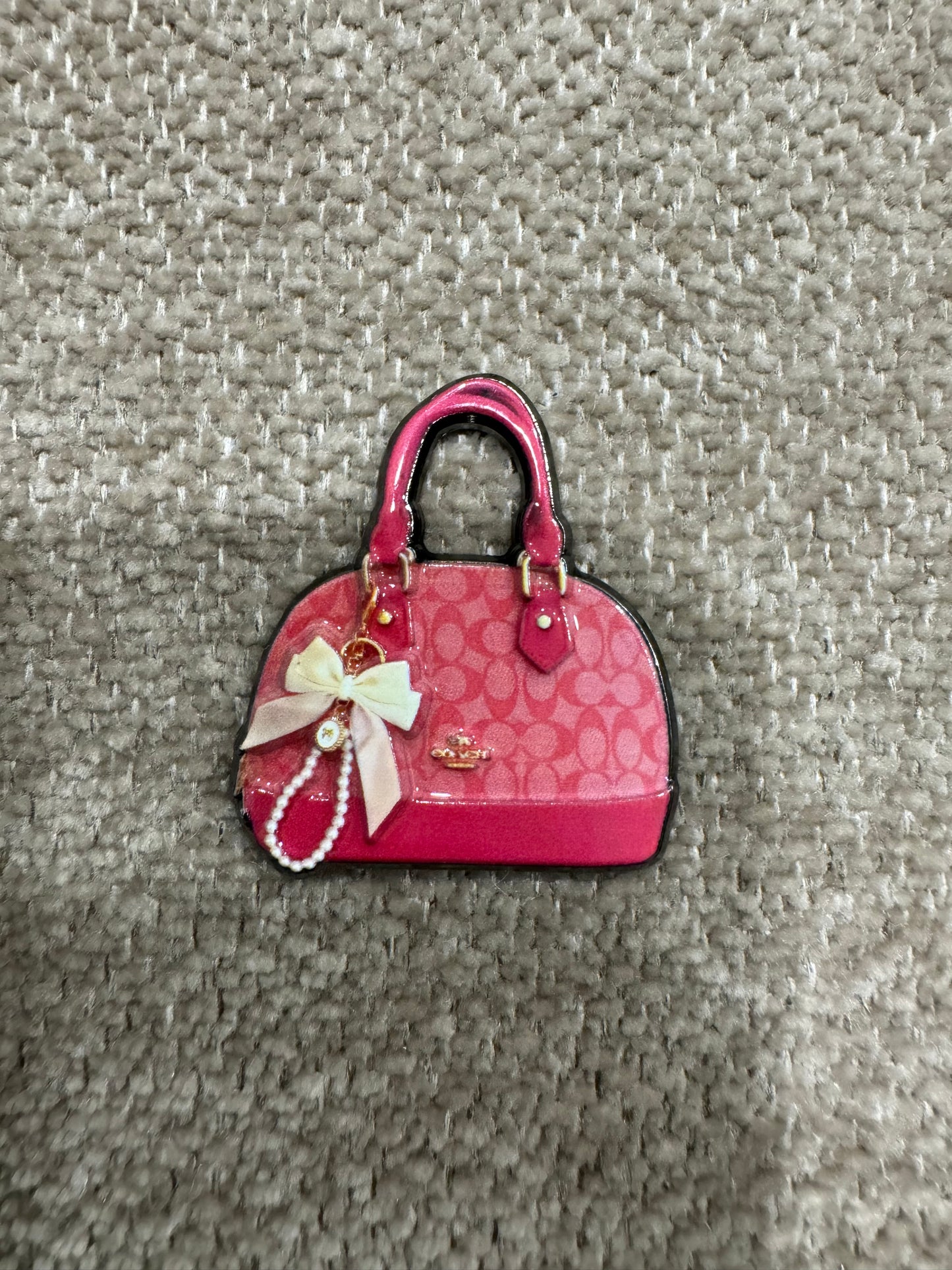 Coach bag charm
