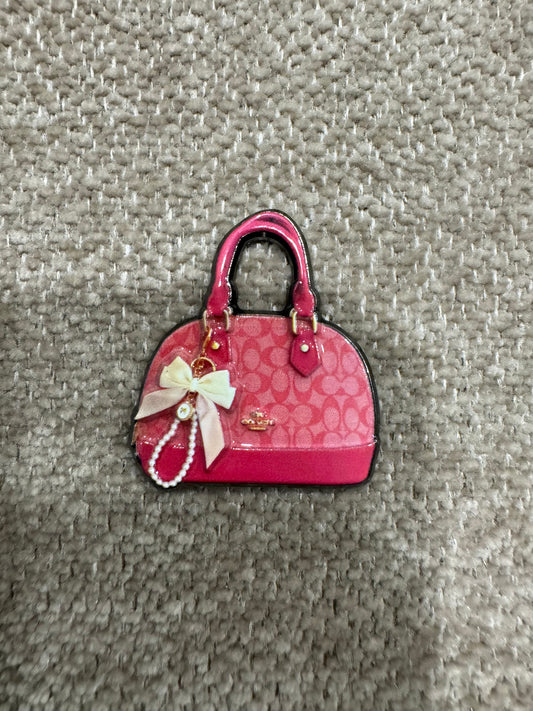 Coach bag charm